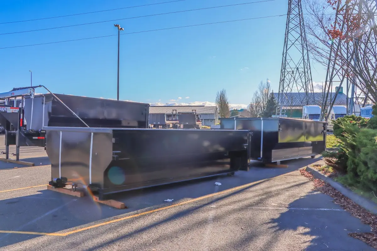 Roll-off dumpster ready for waste disposal at job site for Demolition Dumpster Rental in Lysander